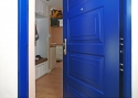 ADLO - Security door ARDEN, panel design KV 203, slats on panels KV - 2, surface RAL 2013