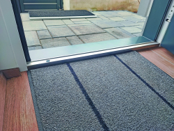 Threshold for TERMO exterior entrance doors to the house, view from the inside