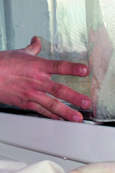 Gluing the foil under the strip